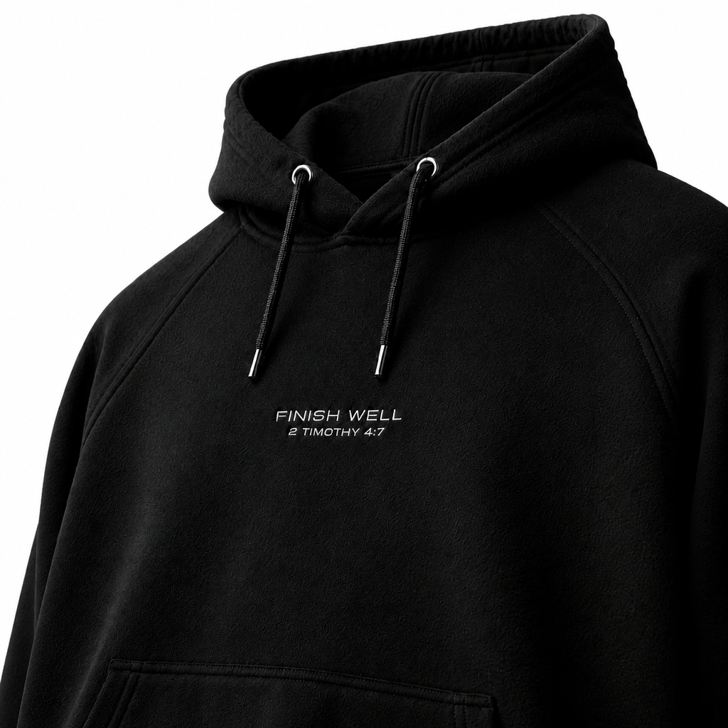 Close-up of embroidered on Finish Well hoodie